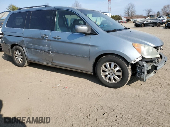 2010 Honda Odyssey EX-L with VIN 5FNRL3H69AB108144, listed as a Copart auction lot 54225615 with 56,609 mi miles and Salvage Title. Bid and sale history available at carsss.com. Image 4.