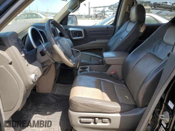 2006 Honda Ridgeline RTL with VIN 2HJYK16596H566552, listed as a Copart auction lot 57516525 with 192,023 mi miles and Salvage Title. Bid and sale history available at DreamBid. Image 7.