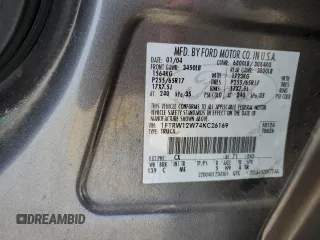 2004 Ford F-150 XLT with VIN 1FTRW12W74KC26169, listed as a Copart auction lot 68393914 with 118,059 mi miles and Salvage Title. Bid and sale history available at DreamBid. Image 12.