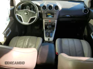 2014 Chevrolet Captiva Sport LTZ with VIN 3GNAL4EK6ES569410, listed as a Copart auction lot 79771094 with 142,157 mi miles and Salvage Title. Bid and sale history available at DreamBid. Image 8.