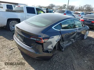 2020 Tesla Model 3 Long Range with VIN 5YJ3E1EB6LF666624, listed as a IAAI auction lot 41720664 with 65,973 mi miles. Bid and sale history available at carsss.com. Image 4.