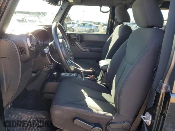 2016 Jeep Wrangler Black Bear with VIN 1C4AJWAG9GL230693, listed as a Copart auction lot 43350885 with 75,761 mi miles and Salvage title. Bid and sale history available at DreamBid. Image 7.