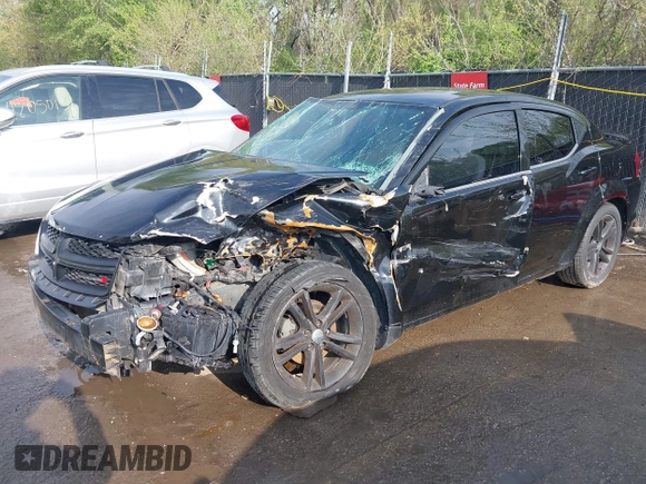 2014 Dodge Avenger SE with VIN 1C3CDZAB6EN120955, listed as a IAAI auction lot 42030602 with Not provided miles and . Bid and sale history available at DreamBid. Image 2.
