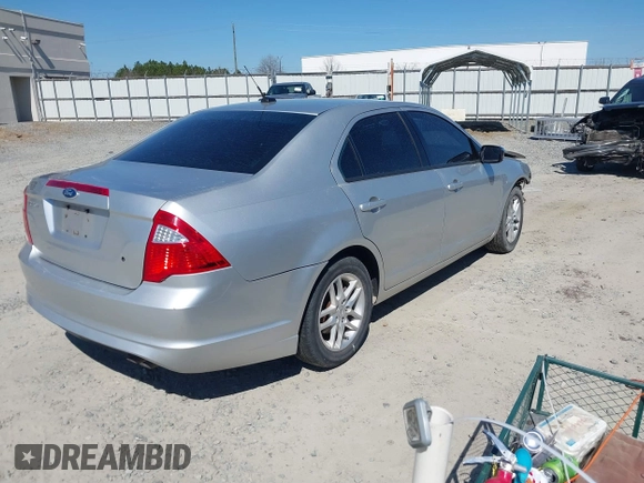2011 Ford Fusion S with VIN 3FAHP0GA3BR311556, listed as a IAAI auction lot 41668511 with 200,159 mi miles. Bid and sale history available at carsss.com. Image 4.