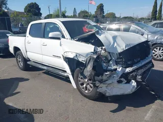 2017 Toyota Tacoma SR5 with VIN 5TFAZ5CN9HX039333, listed as a IAAI auction lot 41701962 with 102,737 mi miles. Bid and sale history available at carsss.com. Image 1.