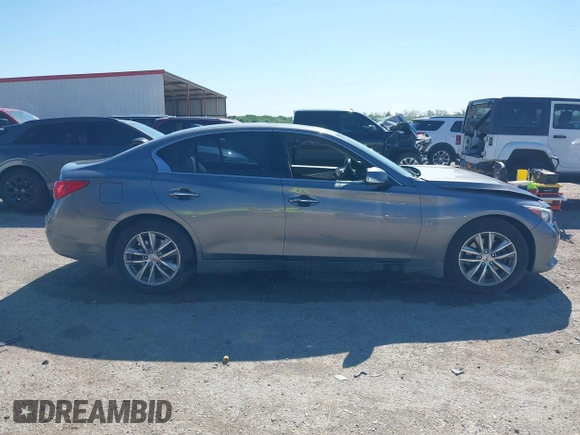 2015 Infiniti Q50 Premium z VIN JN1BV7AR9FM408386, wystawiony jako IAAI lot #42084887 z przebiegiem 122 527 mil mil oraz . Historia ofert i sprzedaży dostępna na DreamBid. Obrazek 14.