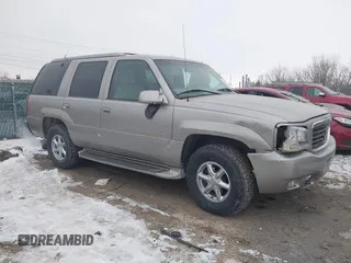 2000 Cadillac Escalade z VIN 1GYEK63R1YR197386, wystawiony jako IAAI lot #41386599 z przebiegiem 77 657 mil mil oraz . Historia ofert i sprzedaży dostępna na DreamBid. Obrazek 6.