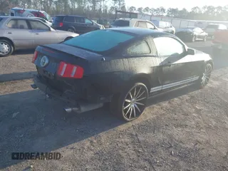 2011 Ford Mustang V6 with VIN 1ZVBP8AM6B5160195, listed as a IAAI auction lot 41803594 with 146,244 mi miles and . Bid and sale history available at carsss.com. Image 4.