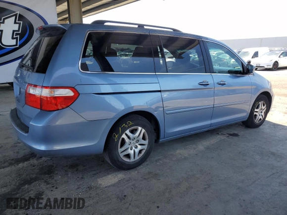 2007 Honda Odyssey EX-L z VIN 5FNRL38647B077250, wystawiony jako Copart lot #56925425 z przebiegiem 159 281 mil mil oraz Szkoda całkowita • Salvage title. Historia ofert i sprzedaży dostępna na DreamBid. Obrazek 3.