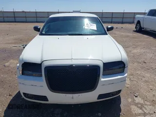 2009 Chrysler 300 Touring with VIN 2C3KA53V89H634048, listed as a IAAI auction lot 41974629 with Not Provided miles and . Bid and sale history available at DreamBid. Image 12.