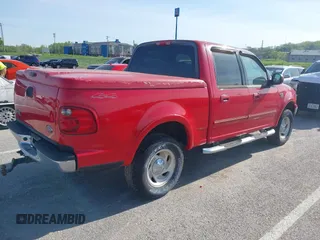 2003 Ford F-150 XLT with VIN 1FTRW08L43KD14456, listed as a IAAI auction lot 42098830 with 234,908 mi miles. Bid and sale history available at carsss.com. Image 4.