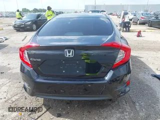 2017 Honda Civic LX with VIN 19XFC2F58HE017759, listed as a IAAI auction lot 42458474 with 111,588 mi miles and . Bid and sale history available at DreamBid. Image 17.