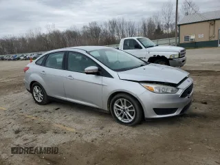 2015 Ford Focus SE with VIN 1FADP3F29FL370335, listed as a Copart auction lot 51010975 with 215,026 mi miles and Clean Title. Bid and sale history available at DreamBid. Image 4.