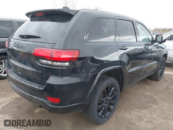 2017 Jeep Grand Cherokee Laredo with VIN 1C4RJFAG7HC886640, listed as a IAAI auction lot 42035301 with 197,110 mi miles. Bid and sale history available at carsss.com. Image 4.