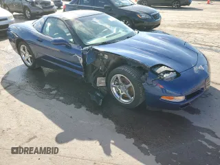 2004 Chevrolet Corvette with VIN 1G1YY22G145132963, listed as a Copart auction lot 74264184 with 74,077 mi miles and Salvage Title. Bid and sale history available at carsss.com. Image 4.