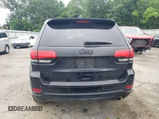 2018 Jeep Grand Cherokee Laredo E with VIN 1C4RJFAG4JC138319, listed as a Copart auction lot 54956925 with 144,938 mi miles and Salvage title. Bid and sale history available at DreamBid. Image 6.