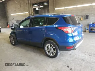 2017 Ford Escape SE z VIN 1FMCU9GD4HUD17066, wystawiony jako Copart lot #60504105 z przebiegiem 64 570 mil mil oraz Szkoda całkowita • Salvage title. Historia ofert i sprzedaży dostępna na DreamBid. Obrazek 2.