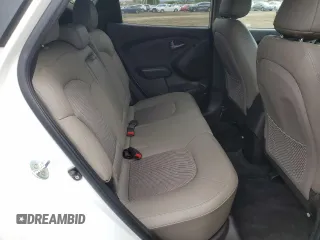 2015 Hyundai Tucson GLS with VIN KM8JT3AF0FU039863, listed as a Copart auction lot 51347815 with 104,469 mi miles and Salvage Title. Bid and sale history available at DreamBid. Image 11.