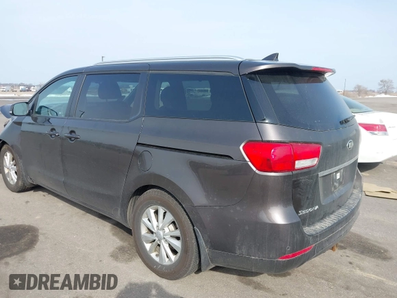 2017 Kia Sedona LX with VIN KNDMB5C19H6329933, listed as a IAAI auction lot 41796158 with 101,399 mi miles. Bid and sale history available at carsss.com. Image 3.