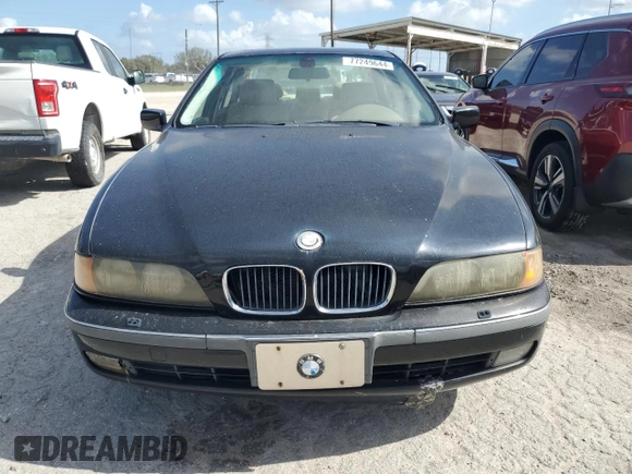 2000 BMW 5 Series 528iA with VIN WBADM6340YGU16735, listed as a Copart auction lot 77249644 with 0 mi miles and Salvage Title. Bid and sale history available at carsss.com. Image 5.