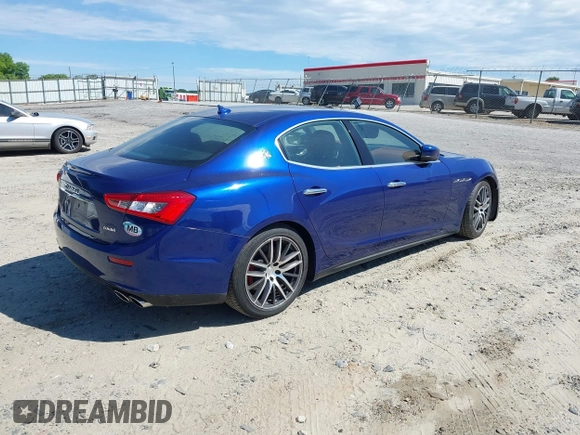 2015 Maserati Ghibli S Q4 with VIN ZAM57RTA1F1144312, listed as a IAAI auction lot 42336740 with 64,897 mi miles and . Bid and sale history available at DreamBid. Image 4.