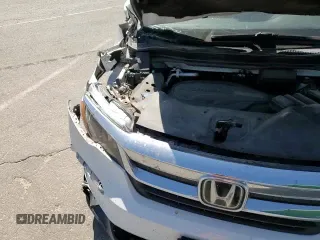 2020 Honda Pilot EX z VIN 5FNYF5H39LB028334, wystawiony jako Copart lot #67347675 z przebiegiem 95 015 mil mil oraz Szkoda całkowita • Salvage title. Historia ofert i sprzedaży dostępna na DreamBid. Obrazek 14.