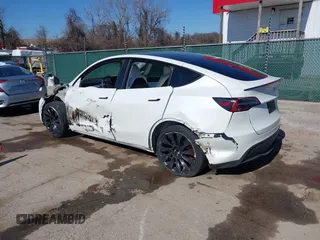 2021 Tesla Model Y Performance with VIN 5YJYGDEF8MF246658, listed as a IAAI auction lot 41679793 with 28,015 mi miles and . Bid and sale history available at DreamBid. Image 3.