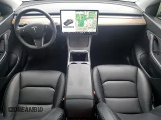 2021 Tesla Model Y Long Range z VIN 5YJYGDEE6MF209034, wystawiony jako Copart lot #57313585 z przebiegiem 54 259 mil mil oraz Szkoda całkowita • Salvage title. Historia ofert i sprzedaży dostępna na DreamBid. Obrazek 8.