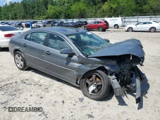 2007 Saturn Aura XE with VIN 1G8ZS57NX7F299403, listed as a Copart auction lot 54828345 with 132,838 mi miles and Salvage Title. Bid and sale history available at DreamBid. Image 4.
