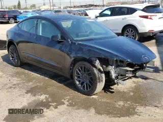 2025 Tesla Model 3 Long Range with VIN 5YJ3E1EA0SF902836, listed as a Copart auction lot 49674245 with 3,302 mi miles and Salvage Title. Bid and sale history available at DreamBid. Image 4.