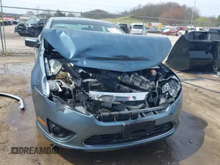 2012 Ford Fusion SE z VIN 3FAHP0HA7CR424958, wystawiony jako IAAI lot #41922636 z przebiegiem 101 149 mil mil oraz . Historia ofert i sprzedaży dostępna na DreamBid. Obrazek 13.