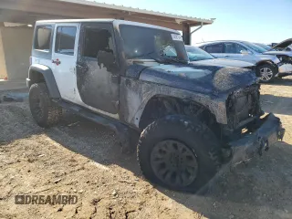 2016 Jeep Wrangler Unlimited Rubicon Hard Rock with VIN 1C4BJWFG2GL243895, listed as a Copart auction lot 84698754 with 0 mi miles and Non Repairable. Bid and sale history available at carsss.com. Image 4.