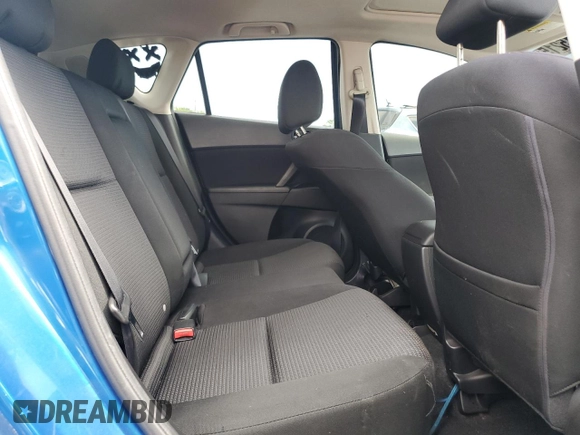 2012 Mazda 3 i Touring with VIN JM1BL1L88C1679005, listed as a Copart auction lot 64215215 with 133,091 mi miles and Salvage title. Bid and sale history available at DreamBid. Image 10.