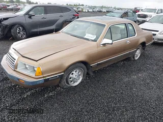1985 Ford Thunderbird with VIN 1FABP46F2FH175017, listed as a IAAI auction lot 42222867 with 77,911 mi miles and . Bid and sale history available at DreamBid. Image 2.