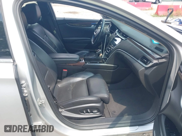 2014 Cadillac XTS Luxury z VIN 2G61N5S38E9270619, wystawiony jako IAAI lot #40140617 z przebiegiem 117 286 mil mil oraz . Historia ofert i sprzedaży dostępna na DreamBid. Obrazek 5.