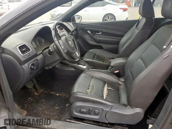 2011 Volkswagen Eos Komfort with VIN WVWBW7AHXBV004597, listed as a Copart auction lot 55067525 with 156,404 mi miles and Clean Title. Bid and sale history available at DreamBid. Image 7.