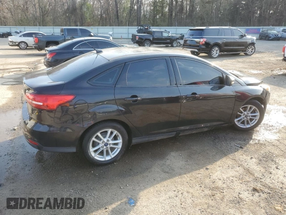 2015 Ford Focus SE with VIN 1FADP3F20FL257194, listed as a Copart auction lot 44021095 with 153,600 mi miles and Salvage Title. Bid and sale history available at carsss.com. Image 3.