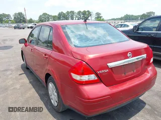 2010 Nissan Versa S with VIN 3N1BC1AP9AL461433, listed as a IAAI auction lot 42409134 with 151,802 mi miles and . Bid and sale history available at DreamBid. Image 3.