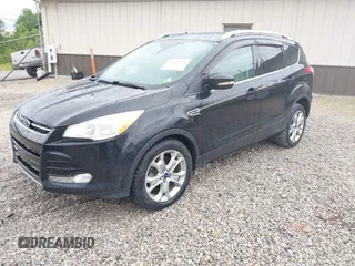 2016 Ford Escape Titanium with VIN 1FMCU9J93GUB93729, listed as a IAAI auction lot 42177294 with 158,859 mi miles and . Bid and sale history available at DreamBid. Image 2.