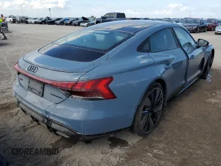 2022 Audi RS e-tron GT z VIN WAUBHBFW4N7901781, wystawiony jako Copart lot #75124364 z przebiegiem 22 581 mil mil oraz Nie do naprawy. Historia ofert i sprzedaży dostępna na DreamBid. Obrazek 3.