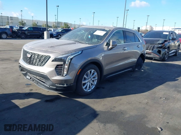 2023 Cadillac XT4 FWD Luxury z VIN 1GYAZAR40PF135132, wystawiony jako IAAI lot #41684609 z przebiegiem 12 164 mil mil oraz . Historia ofert i sprzedaży dostępna na DreamBid. Obrazek 20.