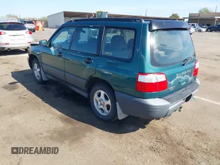 2001 Subaru Forester L with VIN JF1SF63561G719978, listed as a IAAI auction lot 41993814 with 208,781 mi miles. Bid and sale history available at carsss.com. Image 3.