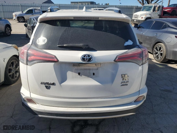2016 Toyota RAV4 XLE with VIN JTMRFREV5GJ103837, listed as a Copart auction lot 42507055 with 99,426 mi miles and Salvage Title. Bid and sale history available at carsss.com. Image 6.