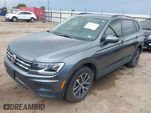2021 Volkswagen Tiguan S with VIN 3VV0B7AX0MM017433, listed as a IAAI auction lot 42017125 with 54,624 mi miles and . Bid and sale history available at DreamBid. Image 19.