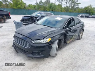 2015 Ford Fusion SE with VIN 3FA6P0HD2FR162756, listed as a IAAI auction lot 42028601 with 210,918 mi miles and . Bid and sale history available at DreamBid. Image 2.