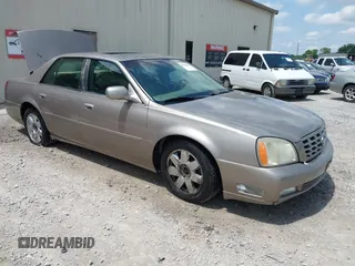 2003 Cadillac DeVille DTS z VIN 1G6KF57993U259918, wystawiony jako IAAI lot #42216058 z przebiegiem 191 408 mil mil oraz . Historia ofert i sprzedaży dostępna na DreamBid. Obrazek 1.