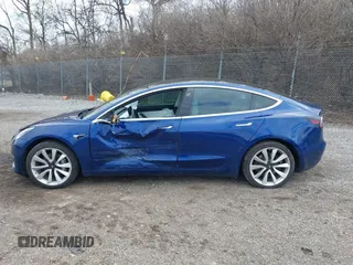 2020 Tesla Model 3 Long Range with VIN 5YJ3E1EB9LF601198, listed as a IAAI auction lot 41744287 with 70,322 mi miles and . Bid and sale history available at DreamBid. Image 15.