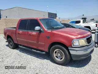 2001 Ford F-150 XLT с VIN 1FTRW07L01KF03457, выставлен на аукционе Copart как лот 60086725 с пробегом 205 917 миль миль и Списание • Salvage title. История ставок и продаж доступна на DreamBid. Изображение 4.