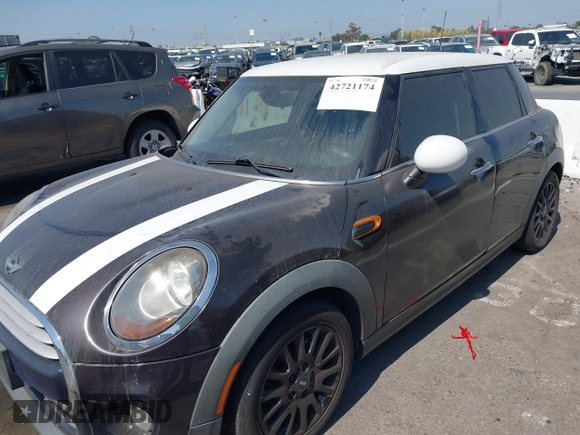 2015 MINI Hardtop 4 Door z VIN WMWXS5C55FT830653, wystawiony jako IAAI lot #42721174 z przebiegiem 126 298 mil mil oraz . Historia ofert i sprzedaży dostępna na DreamBid. Obrazek 6.