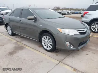 2014 Toyota Camry Hybrid LE with VIN 4T1BD1FK8EU102685, listed as a IAAI auction lot 41469306 with 91,606 mi miles. Bid and sale history available at carsss.com. Image 1.